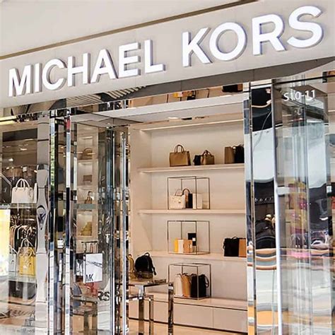 does michael kors do price adjustments|michael kors outlet returns.